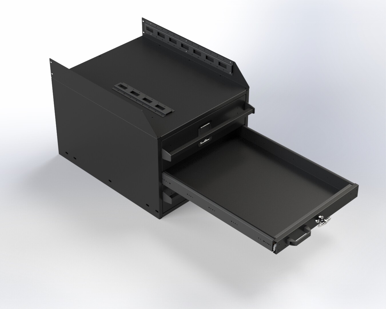 Wide lower drawer of the cabinet pulled fully out, empty rubber-lined base riding on heavy-duty slides