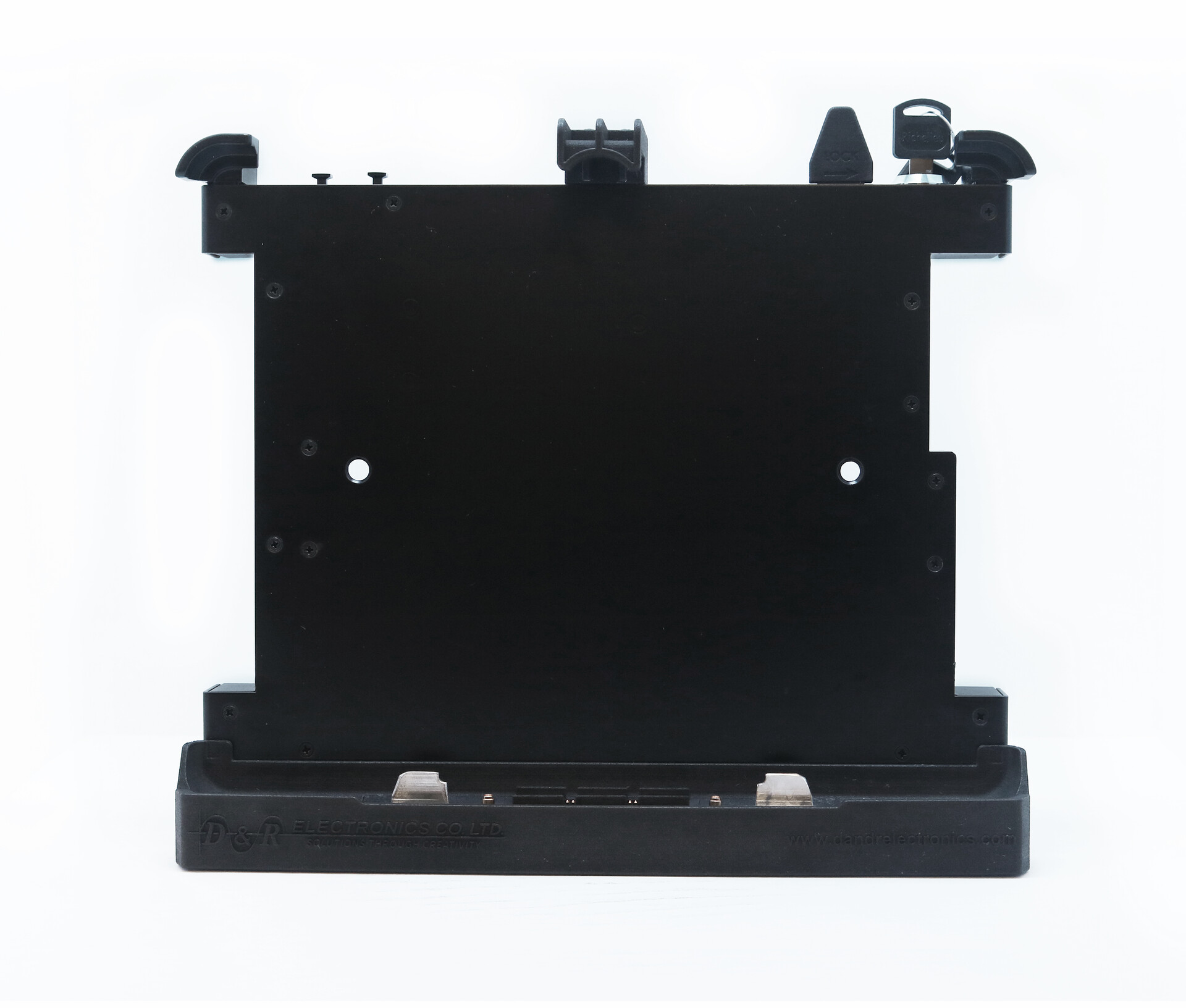 Front of the bare dock: flat tablet plate, top retaining clips, key in the lock and base connector