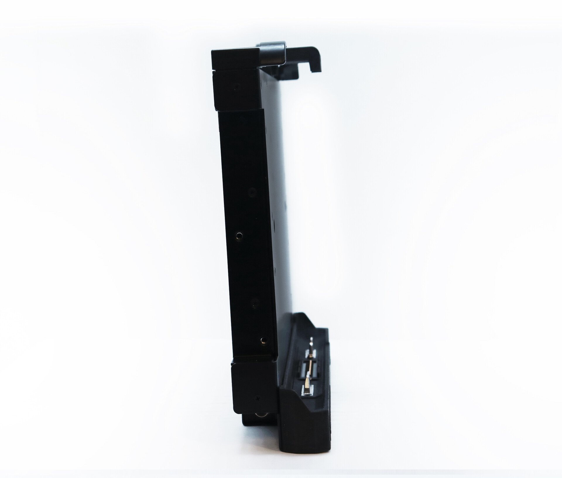 Edge-on profile showing how thin the unit is, with the top hook arm and the base connector